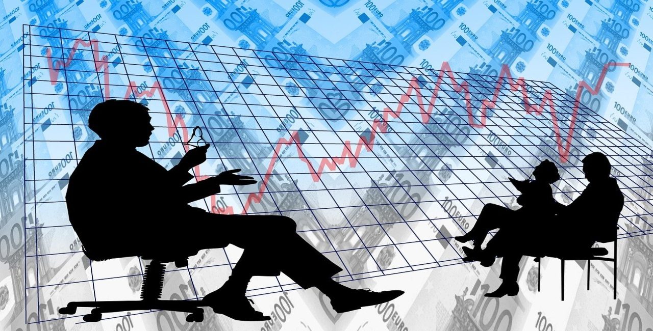 Silhouettes of business professionals analyzing market charts and growth data